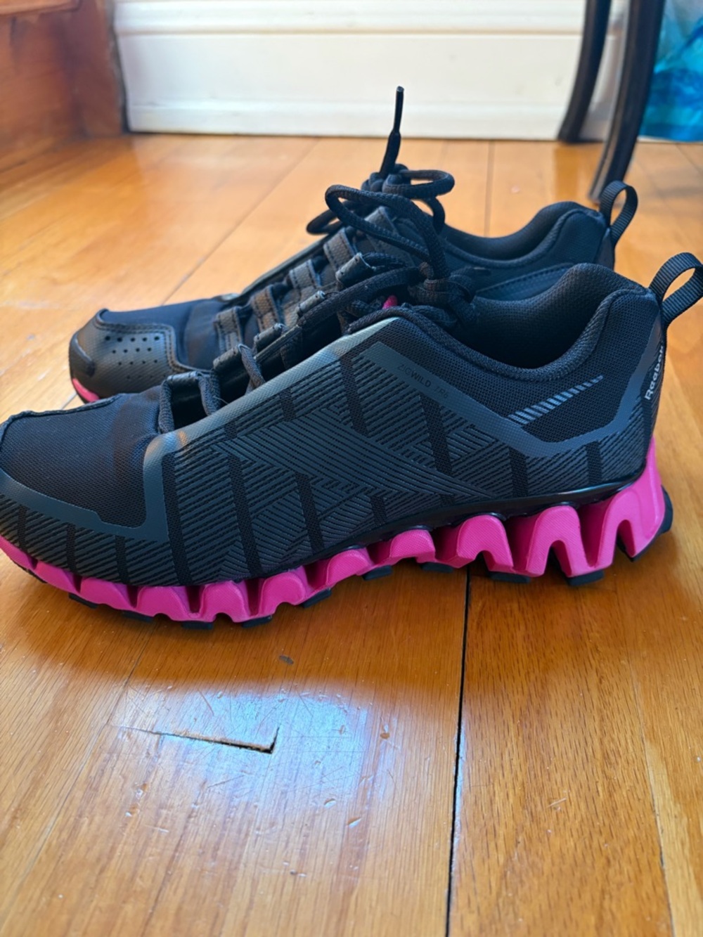 Reebok Black Athletic Sneakers with Pink Zigzag Sole